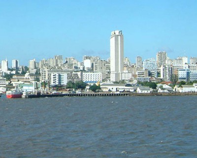 [ Maputo skyline from cruiseship East Africa: Photo by Andrew Moir. This work is licensed under the Creative Commons Attribution-ShareAlike 2.5 License ]